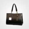Stylish black patent leather handbag with gold chain straps and decorative charms, perfect for formal occasions or bridal accessories.