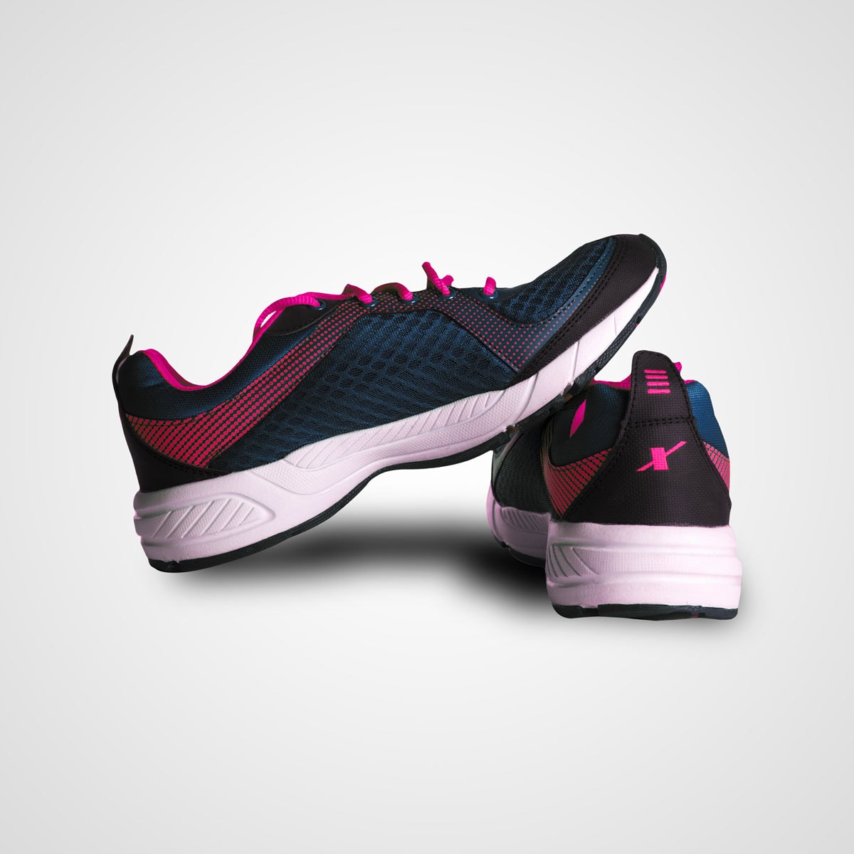 Stylish women's running shoes with pink and black accents, perfect for active brides and fitness enthusiasts.