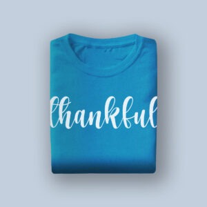 Blue "thankful" T-shirt, perfect for bridal gratitude, casual wedding accessories, and bridal party gifts. Comfortable and stylish for wedding celebrations and thankfulness expressions.