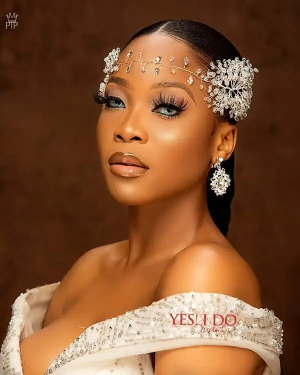 Luxury bridal hair vine and earrings set with crystals and pearls, perfect for Lagos brides, available at Yes I Do Bridal Lekki, Lagos, Nigeria