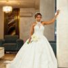 Uju halter neck luxury wedding gown featuring a sleek silhouette and elegant neckline, available at Yes I Do Bridal Lekki, Lagos, Nigeria