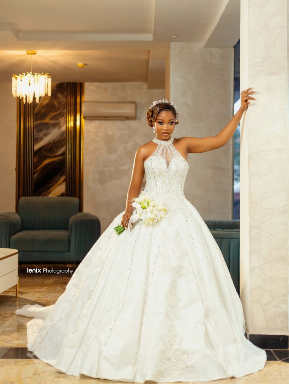 Uju halter neck luxury wedding gown featuring a sleek silhouette and elegant neckline, available at Yes I Do Bridal Lekki, Lagos, Nigeria