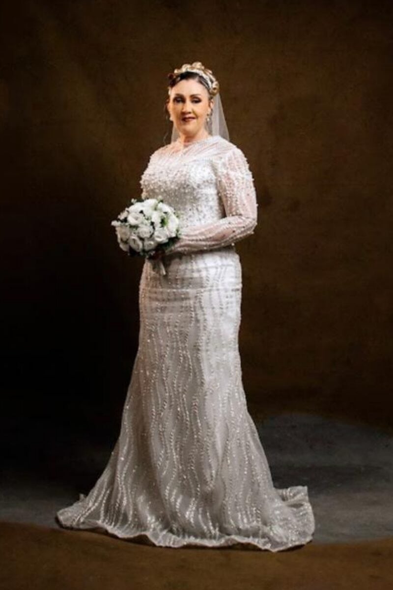 Long sleeve wedding gowns available for rent in Lekki